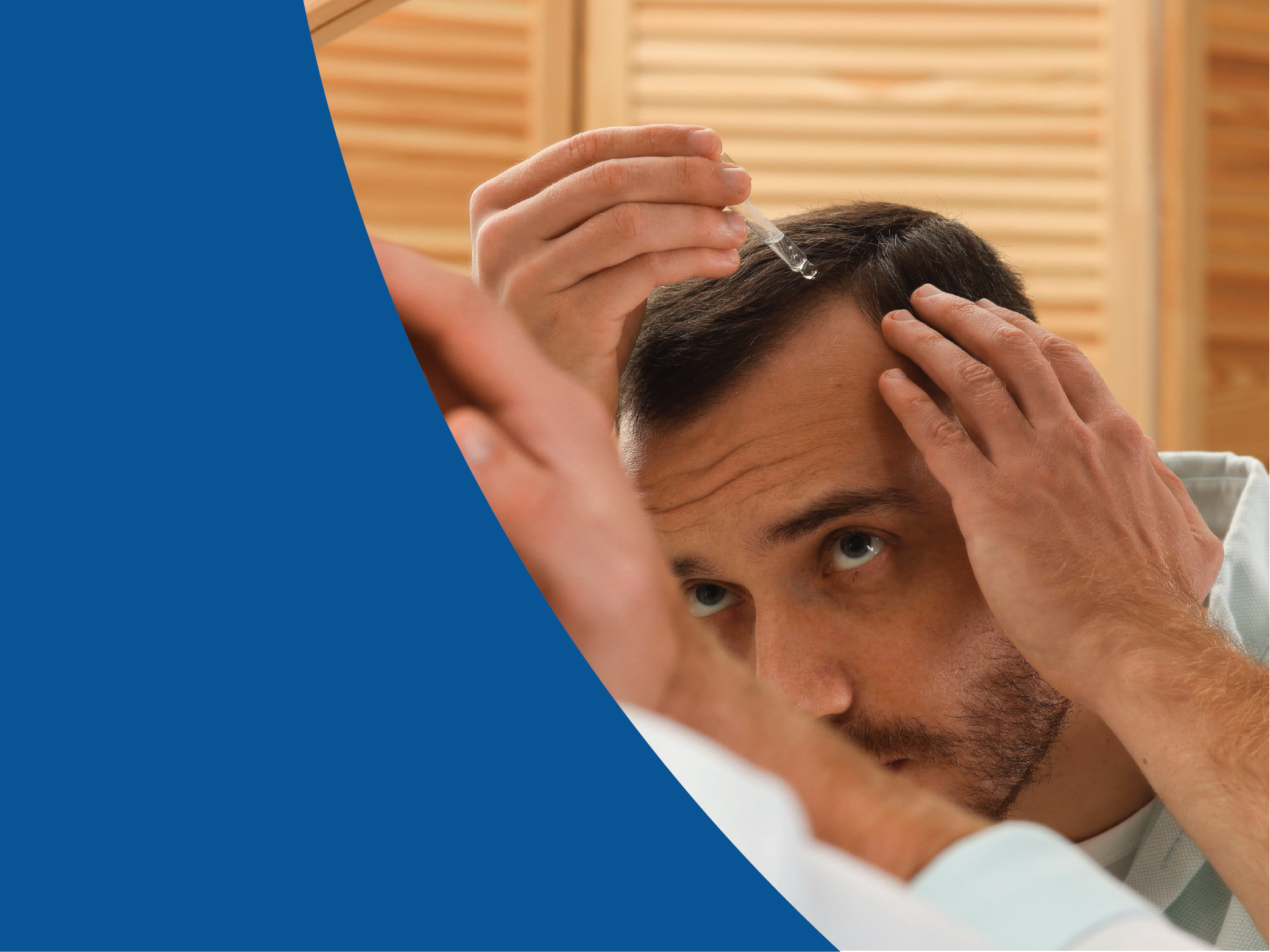Man treating hair loss with topical treatment in front of mirror.